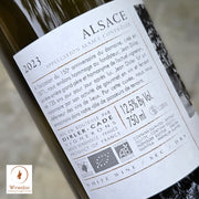 Wine bottle label with 'Alsace' text and product details. Dirler-Cadé Mémoire 2023.
